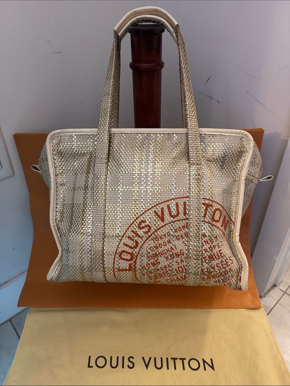 Louis Vuitton Metallic Beige Tote with Red Logo Stamp